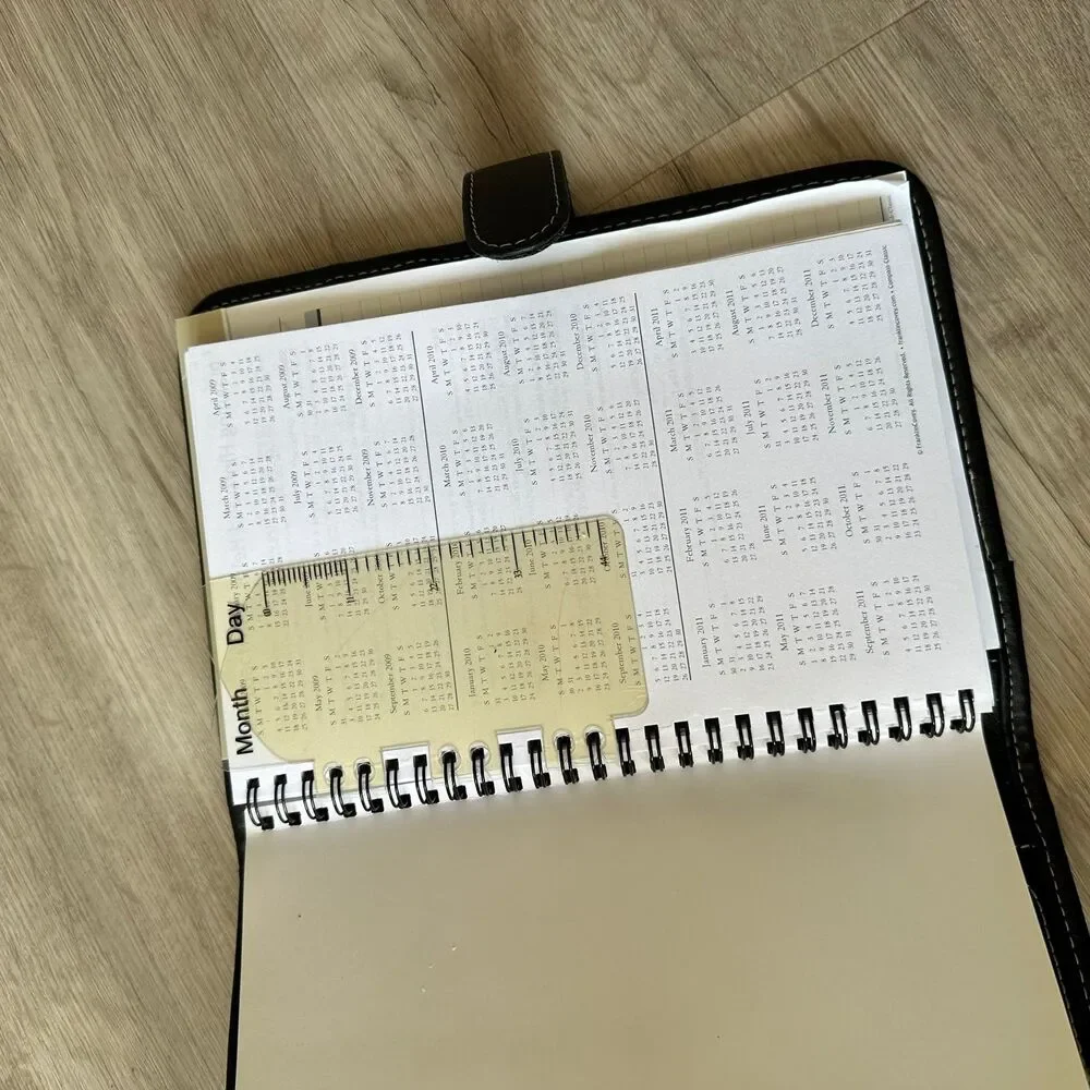 Franklin Covey Compass Planning System Black Leather Planner with undated insert